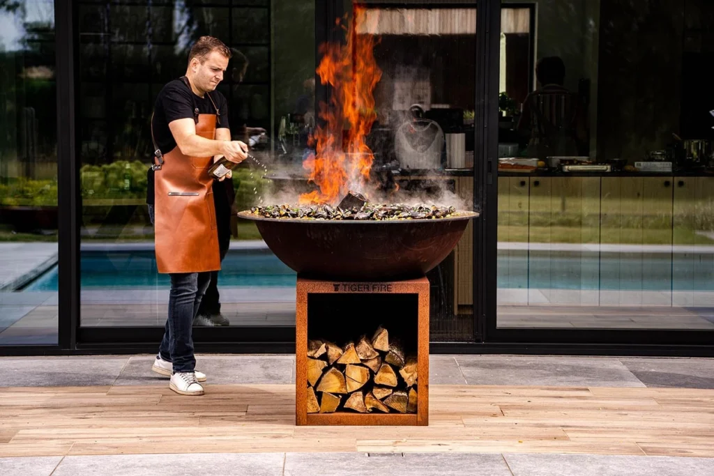Notre brasero plancha BBQ offre une polyvalence inégalée pour toutes vos grillades en plein air. Barbecue | TIGER FIRE OFFICIAL STORE | TIGER FIRE SHOP | TIGER FIRE | BBQ SHOP | PLANCHA BBQ | BRASERO BBQ | BBQ BRASERO | BRASERO barbecue | BRASERO PLANCHA BBQ | GRILL PLANCHA BBQ | BBQ GRILL | PLANCHA GRILL BBQ | BBQ GRIDDLE | Grillade à la plancha | Barbecue à la plancha | Acheter un barbecue | Acheter barbecue | Acheter bbq | Acheter Brasero Plancha bbq